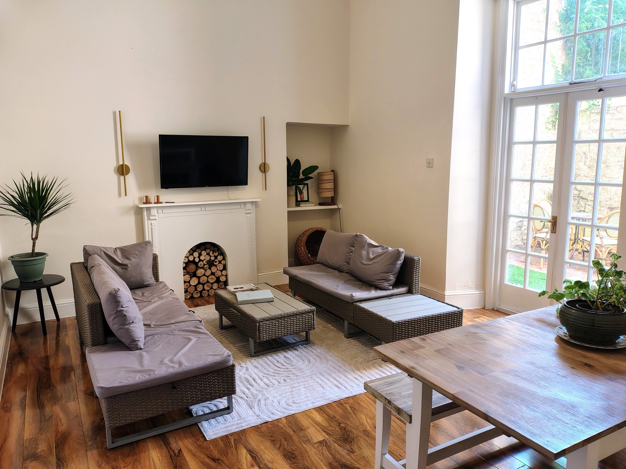 Spacious living and dining room with French doors