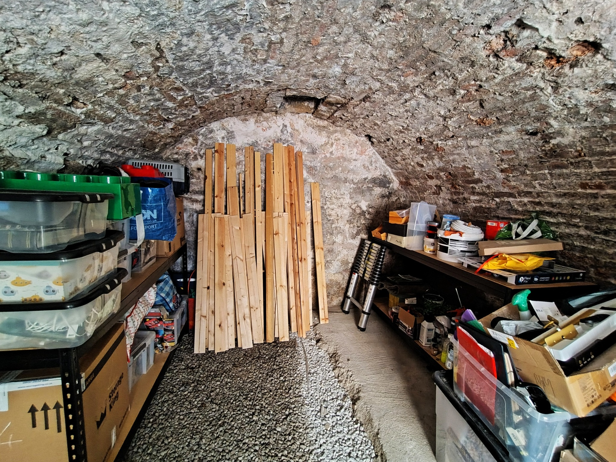 Original vaulted stone storage and workshop space